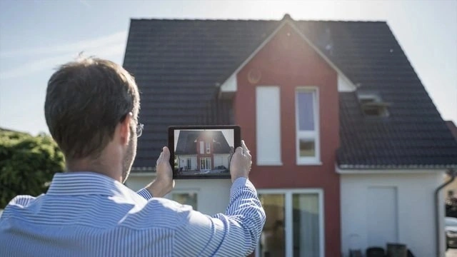 Home seller consulting with a real estate agent before listing property for sale