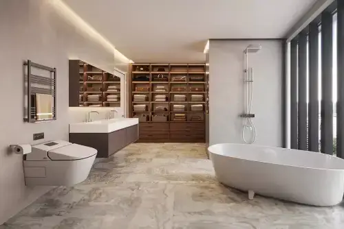 Exterior night‑view of Central Park 104 towers in Sector 104, Gurugram, with illuminated sky‑walk and landscaped foreground.