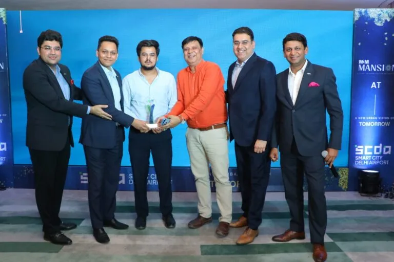 Award ceremony honoring company achievements in real estate