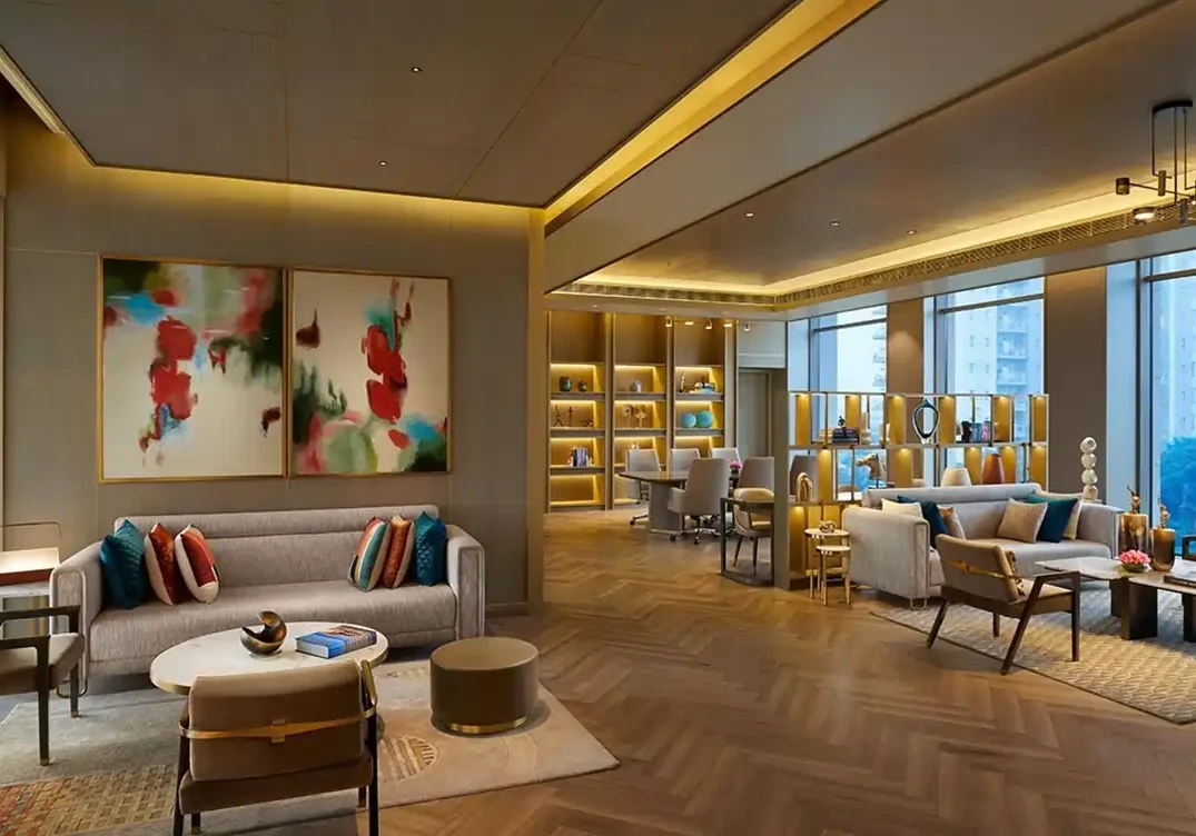 Central Park 104 img Modern high‑rise towers of Central Park 104 on Dwarka Expressway, Gurugram, featuring external capsule lifts and a panoramic sky‑walk linking the buildings.