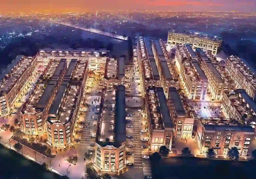 Spaze Grand Central 114 Gurgaon illuminated at night