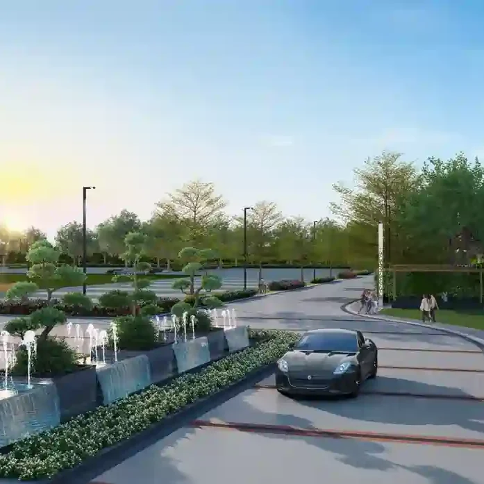 Elegant entrance of M2K Olive Greens with ample parking for residents and visitors.