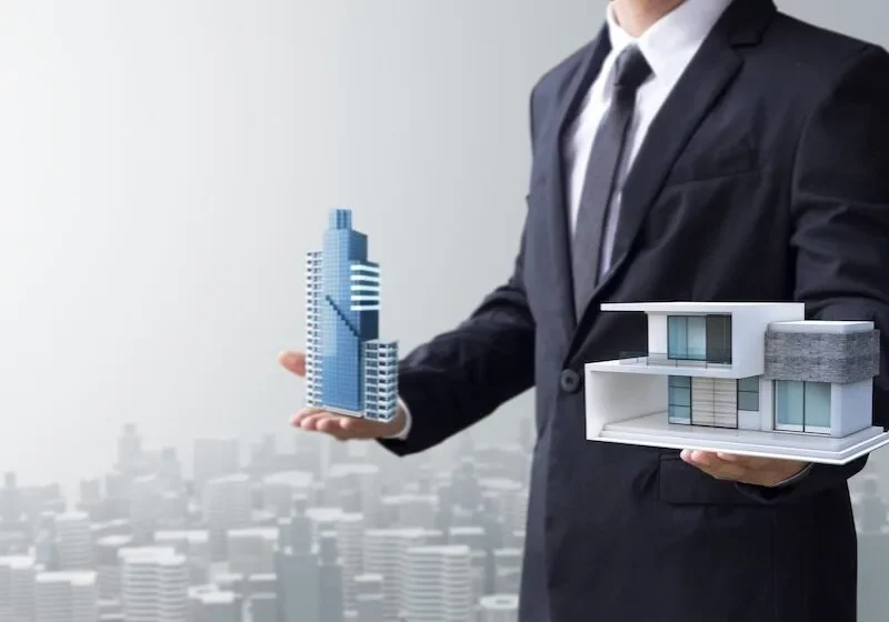 Modern real estate business team discussing property deals