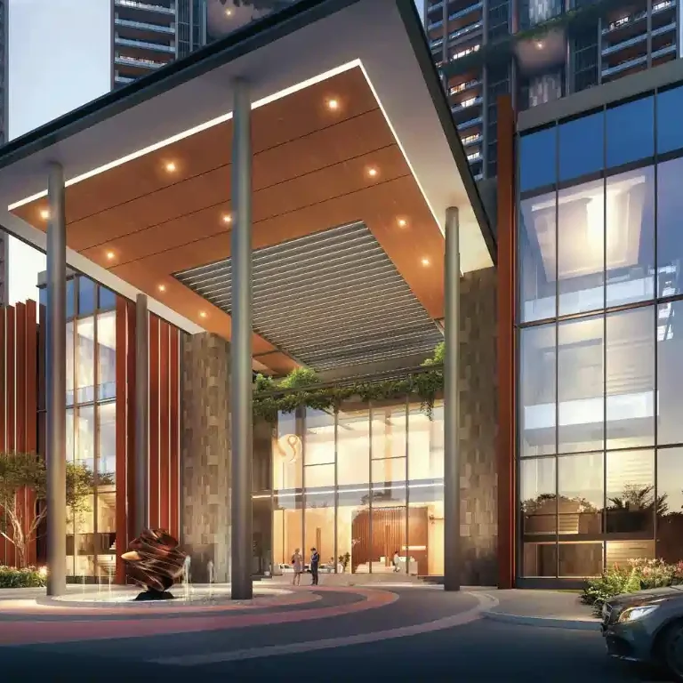 Illuminated entrance gate of Tulip Melrose at night