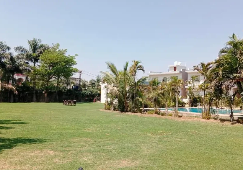 Grand entrance of Whispering Woods farmhouses Naugaon Alwar